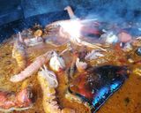 Foto del paso 8 de la receta: Arroz con bogavante, cigalas y calamar