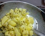 A picture of step 1 of Jhatpat aloo.