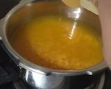 A picture of step 2 of Dal Chingri/Red Lentils with Shrimps.