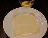 A picture of step 7 of Cheeseburger Egg rolls.