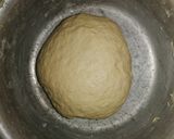 A picture of step 5 of Custard filled Donut balls:.