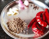 A picture of step 1 of Pulilakari (poricha kuzhambu).