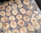 A picture of step 2 of Dehydrated banana 🍌 chips. Dusted with cinnamon.