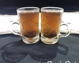 A picture of step 3 of Tulsi and Palm Jaggery Tea.