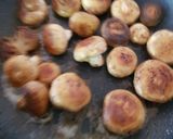 A picture of step 3 of My Butter Fried Pansetta Garlic mushrooms and cherry Tomatoes.