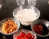 A picture of step 1 of Pomegranate and Walnut Parfait With Greek Yoghurt.