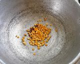 A picture of step 2 of Coconut rice.
