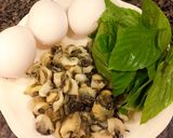 Hình bước làm 1 của món Ốc trộn lá quế,trứng chiên
