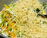 A picture of step 4 of Whosayna’s Veggie Spaghetti served with Meat balls and Red Sauce.