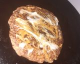 A picture of step 2 of Masala oats cheela pizza.
