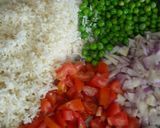 A picture of step 1 of Gobhi Matar Keema.