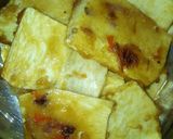 A picture of step 4 of Fried yam coated in curryed flour.