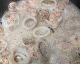 Foto del paso 7 de la receta: Sepia con gambas y calamares en salsa de ajo, perejil y coco…con base de arroz blanco