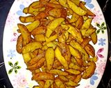 A picture of step 5 of Baked rosemary potatoe wedges.