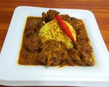 A picture of step 9 of Dhaba Mutton with corn pulao.