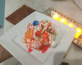 A picture of step 5 of Pineapple delight with m&m bunties.