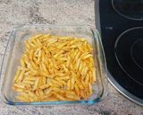 Foto del paso 4 de la receta Pechuga rebozada con pasta al horno
