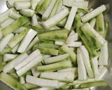 A picture of step 1 of Coconut Ridge Gourd Sabji.