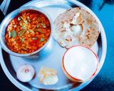 A picture of step 6 of Healthy tasty fiber rich moong dal and turai sabji and millet flour roti.