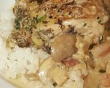 A picture of step 20 of Roast Chicken Thighs in a Sautéed Mushroom Parmasan Garlic Cream.