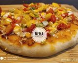 A picture of step 11 of Cheese burst pizza kadai baked.