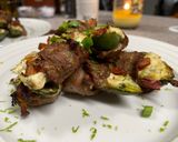 A picture of step 9 of Steak Wrapped Stuffed Jalapeños.