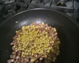 A picture of step 1 of Sweet con and hot dog fry rice.