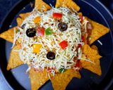 A picture of step 7 of Cheesy loaded vegetable Nachos.