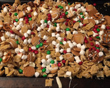 A picture of step 4 of Buddy the elf Chex mix.