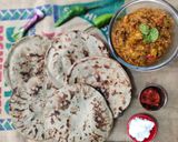 A picture of step 6 of Ola rotla ll baingan ka bharta or bajre ki roti.
