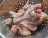 A picture of step 1 of Smokey tandoori chicken drumsticks biryani with mint mango raita.