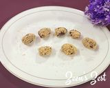 A picture of step 3 of Poppy Seeds covered Dates.