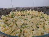 Papas con queso y huevo al horno
