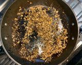 A picture of step 3 of Cumin-fried pardon peppers.