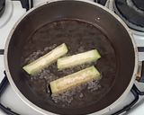 Foto del passaggio 9 della ricetta Fiori di zucca ripieni alla feta, melanzane e menta