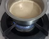 A picture of step 3 of Hot Cardamom Coffee.