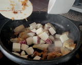 Foto del paso 7 de la receta: Arroz con bacalao y alcachofas