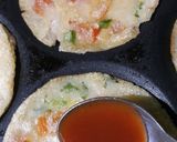 A picture of step 5 of Mini Rava Uttapam Pizza.