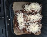 A picture of step 11 of Air Fryer Stuffed Eggplants with Ground Beef.
