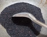 A picture of step 1 of Black sesame ladoo.