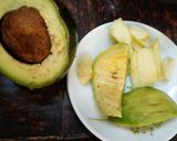A picture of step 2 of Zucchini stuffed with cheesy Guacamole.