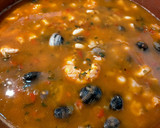 Foto del paso 5 de la receta: Arroz meloso con gambones, calamares y almejas
