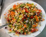 Une image de l'étape 17 de Salade de coquillettes aux carottes, tomates bicolores et oignon rouge.