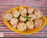 A picture of step 8 of Bhat karela pur with white sauce.