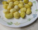 A picture of step 1 of Kashmiri Dum Aloo.