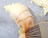 Foto del paso 2 de la receta: Croissants de jamón y queso crema