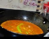 A picture of step 12 of Jalebi fish cooked with mustard paste(Machha besara/fish besara).