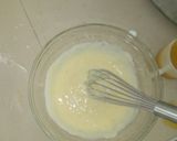 A picture of step 3 of Mango pulp with yorghut.