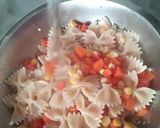 A picture of step 4 of Farfalle Pasta in Cheesy White Sauce.