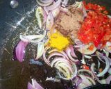 A picture of step 11 of Dambu shinkafa with veg.sauce.
